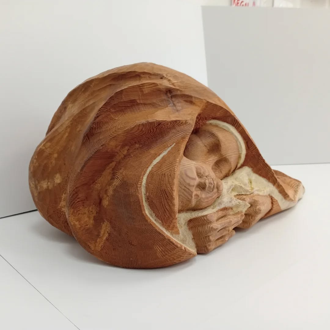 Detalle de Piedad, talla en madera